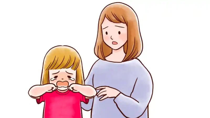 泣く子ども　心配する親